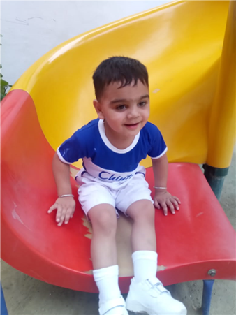 Playgroup Enjoying Swings